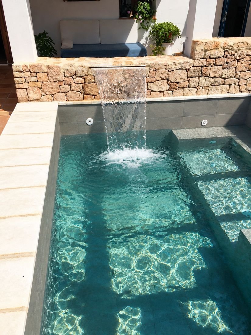 Mediterranean pool with waterfall